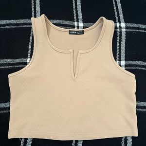 Beige crop top with collar slit